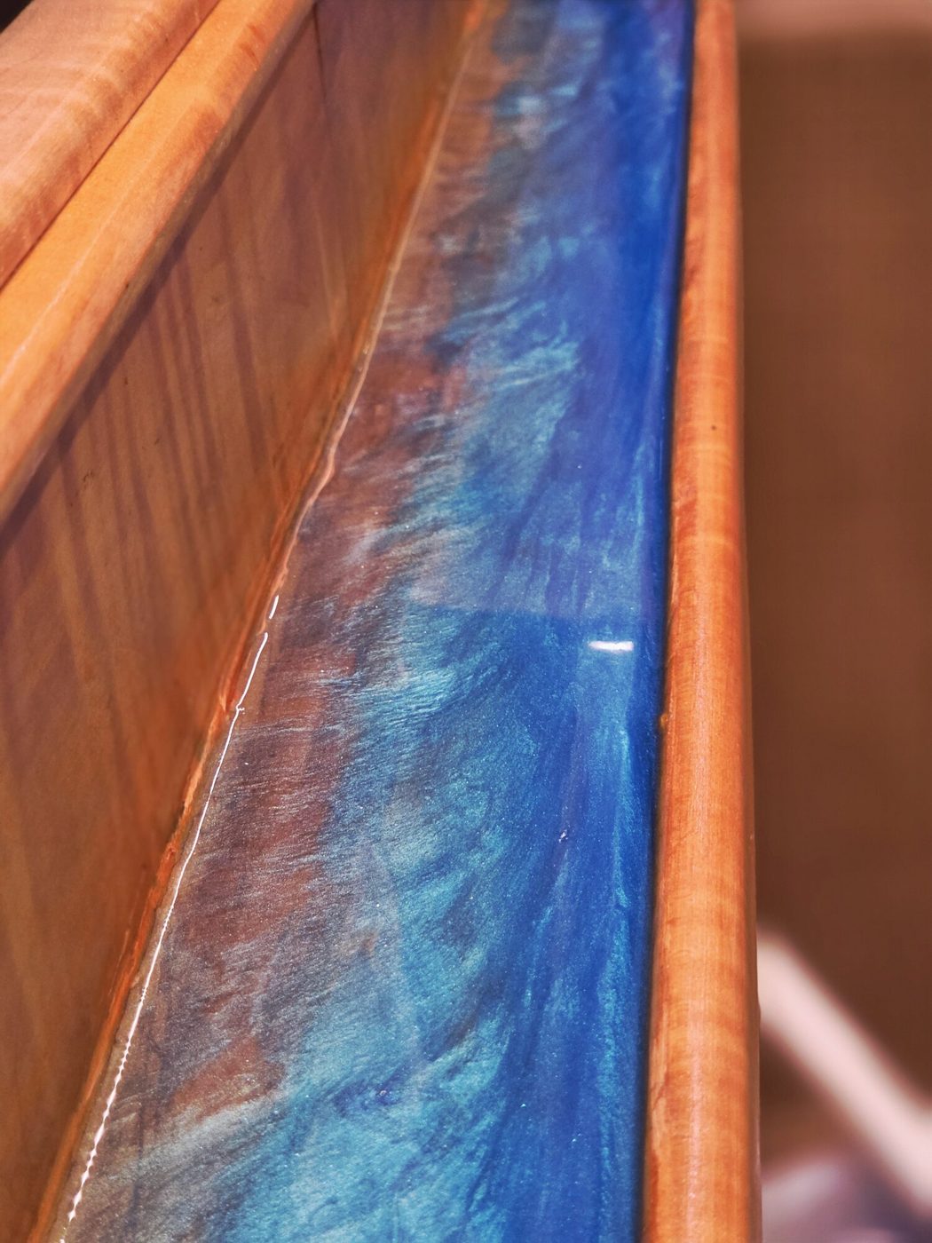 Bar top edge with blue and copper resin