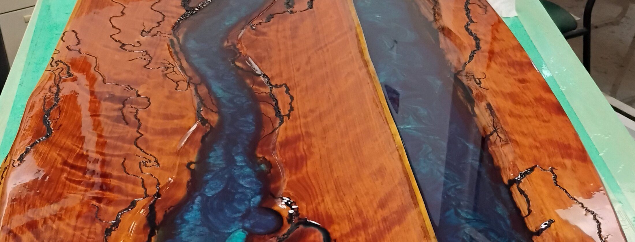 Red cedar river table, panoramic detail