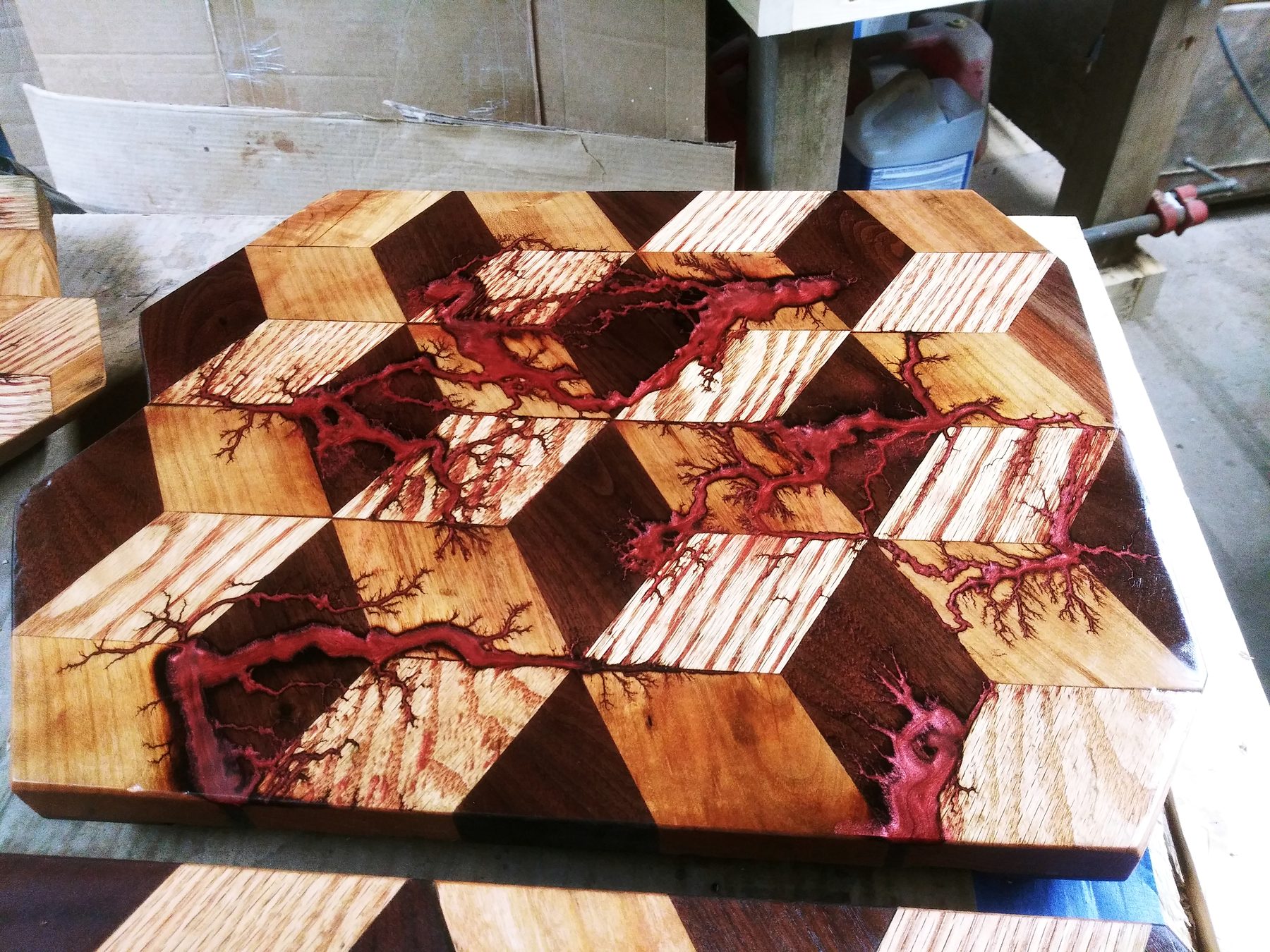 Red resin filling the burn channels